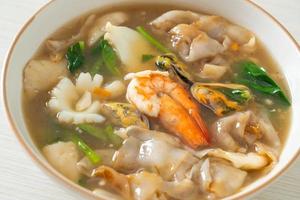 Wide Rice Noodles with Seafood in Gravy Sauce photo