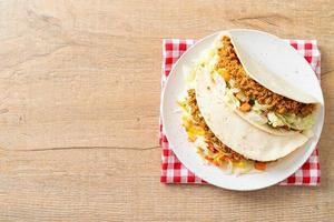 Mexican tacos with minced chicken photo