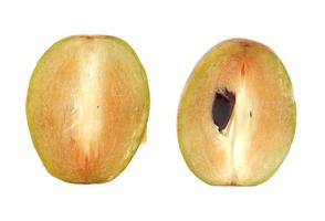 Fresh sapodilla plum with cut on white photo