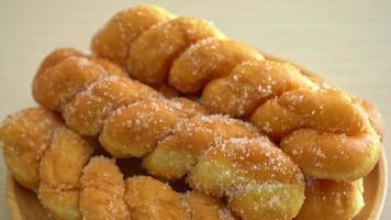 beignets au sucre en forme de spirale video