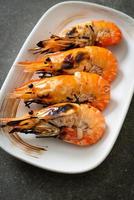 Grilled river prawns or shrimps - seafood style photo