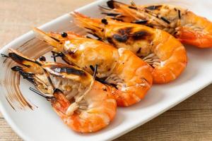 Grilled river prawns or shrimps - seafood style photo