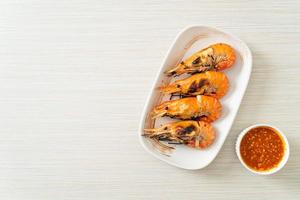 Grilled river prawns or shrimps - seafood style photo