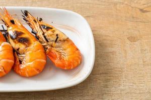 Grilled river prawns or shrimps - seafood style photo