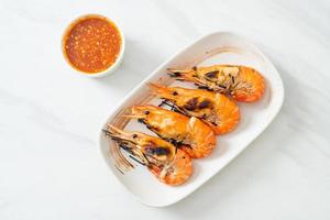 Grilled river prawns or shrimps - seafood style photo