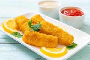 Fried fish finger stick or french fries fish with sauce photo