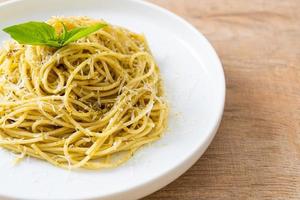 Pesto spaghetti pasta - vegetarian food and Italian food style photo