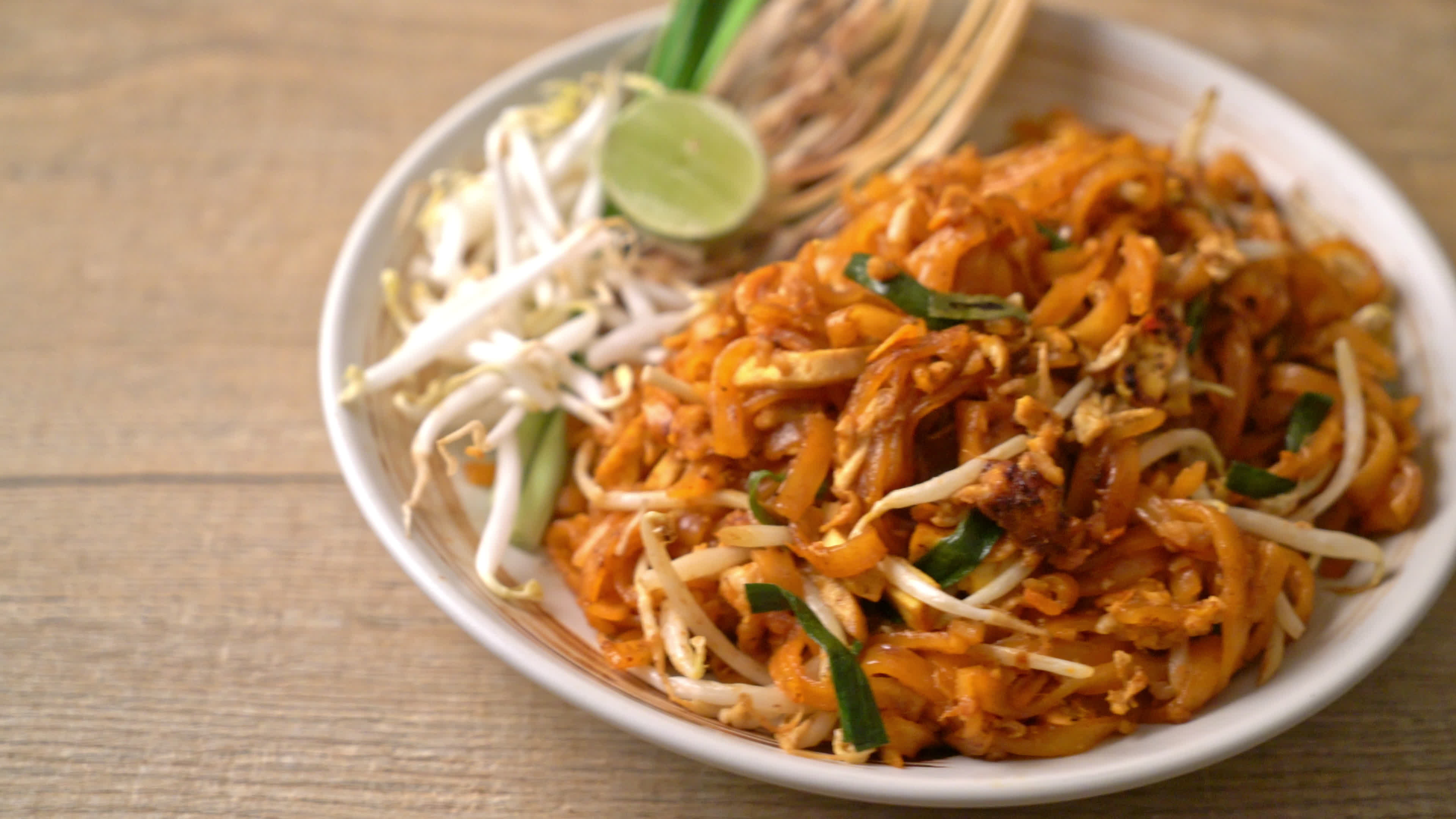 Stir-Fried Noodles with Tofu 3153964 Stock Video at Vecteezy