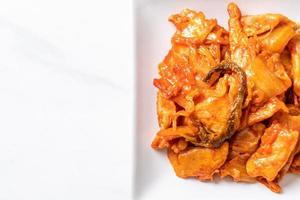 Stir-fried pork with kimchi - Korean food style photo