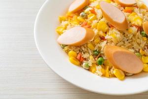 Fried rice with sausage and mixed vegetable photo