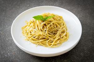 Pesto spaghetti pasta - vegetarian food and Italian food style photo