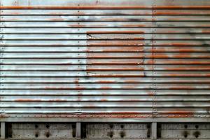 Blue grunge metal plate texture. photo