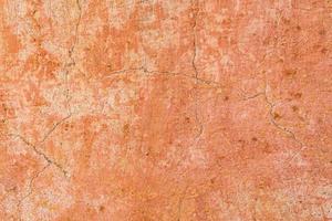 Brown adobe clay wall texture background. photo