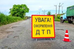 Road sign on the track meaning traffic accident photo