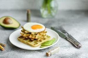 Fresh delicious and nutritious breakfast with waffles with spinach photo