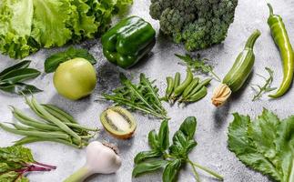 Composition of bright and juicy green vegetables, spices and herbs