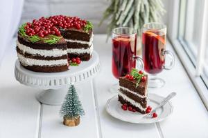 Beautiful delicious cake with bright red berries photo