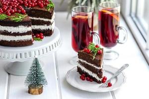 Beautiful delicious cake with bright red berries photo