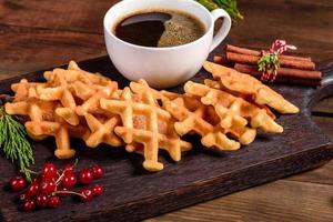 Beautiful delicious Belgian waffles on a Christmas table photo
