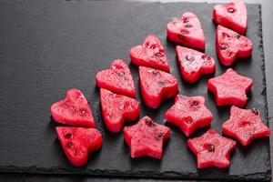 Fresh delicious watermelon sliced with mint and watermelon juice photo