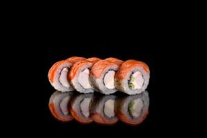 Fresh sushi rolls prepared from the best varieties of fish and seafood photo