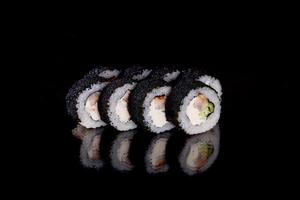 Fresh sushi rolls prepared from the best varieties of fish and seafood photo