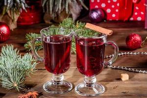 Hot mulled wine for winter and Christmas with various spices photo
