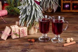Hot mulled wine for winter and Christmas with various spices photo
