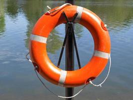 Life buoy at water side photo