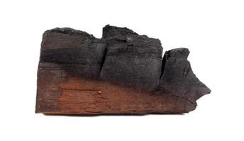 Wood charcoal isolated on a white background photo