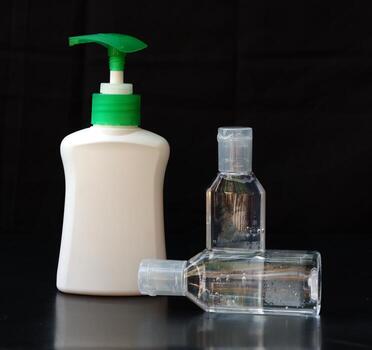 Hand sanitizer isolated on a black background photo