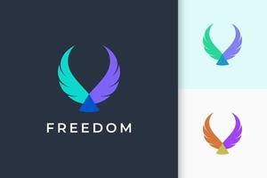 El logotipo del ala representa la libertad y el poder de un avión o una empresa de tecnología. vector