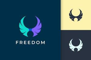 El logotipo del ala representa la libertad y el poder de un avión o una empresa de tecnología. vector