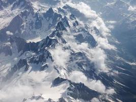Aerial view of the Alps mountains photo