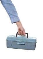 Worker holding tool box on white background photo