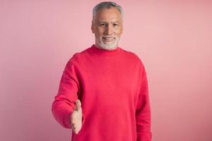 Man holds out his hand, wants to say hello photo