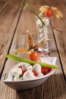 Bocconcini with tomatoes photo