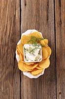 Corn chips and curd cheese photo