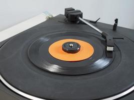 Vinyl record on turntable photo