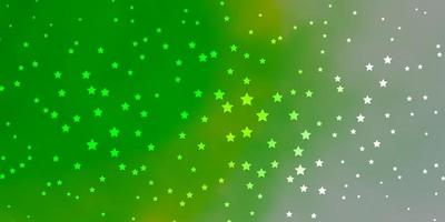 Dark Green vector background with colorful stars.