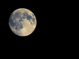 Full moon seen with telescope, enhanced colours