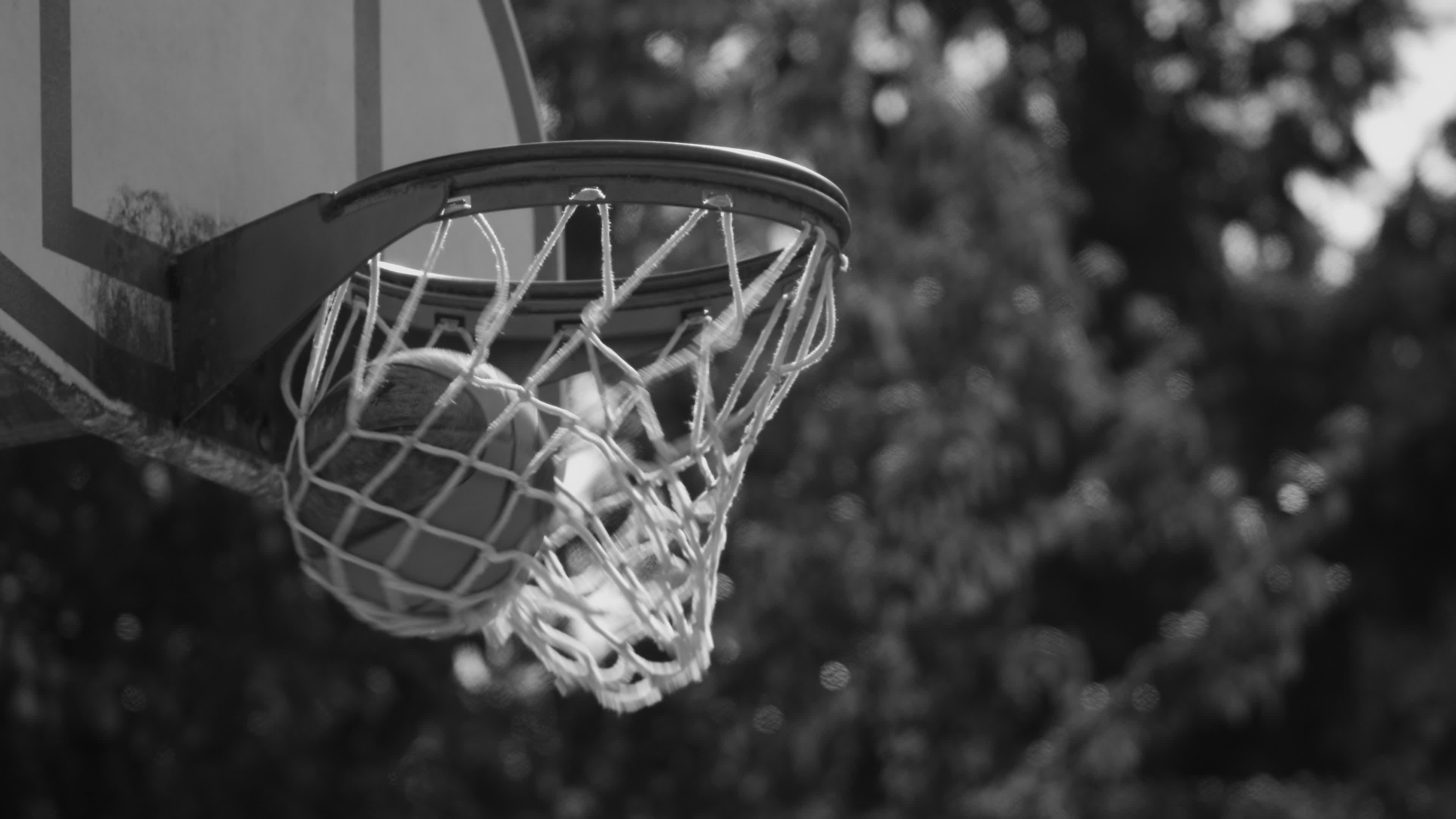 Basketball goes into hoop 3165726 Stock Video at Vecteezy