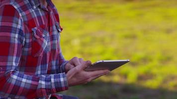 Farmer using digital tablet video