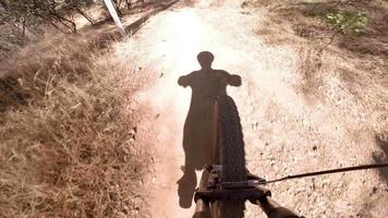 POV action camera shot of Man riding mountain bike video