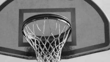 Basketball goes into hoop video
