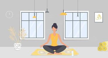 The woman is meditating sitting in the lotus pose on the sofa vector