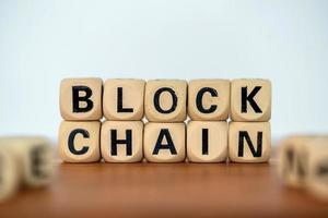 Blockchain on wooden block photo