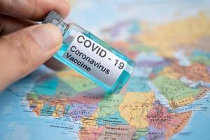 Coronavirus Covid-19 vaccine on Africa map photo