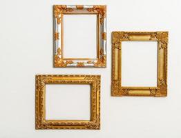 Empty picture frame on white wall background with copy space photo