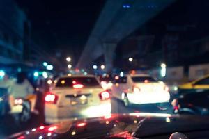 Blurred traffic jam on rush hour time, shooted from inside of car photo